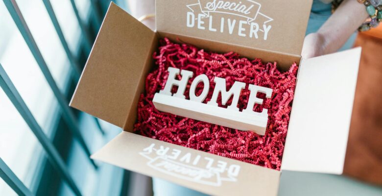 wooden letters in box filled with cut paper