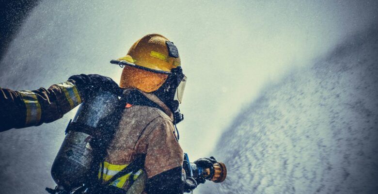 fireman holding fire hose