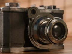 vintage camera on wooden surface